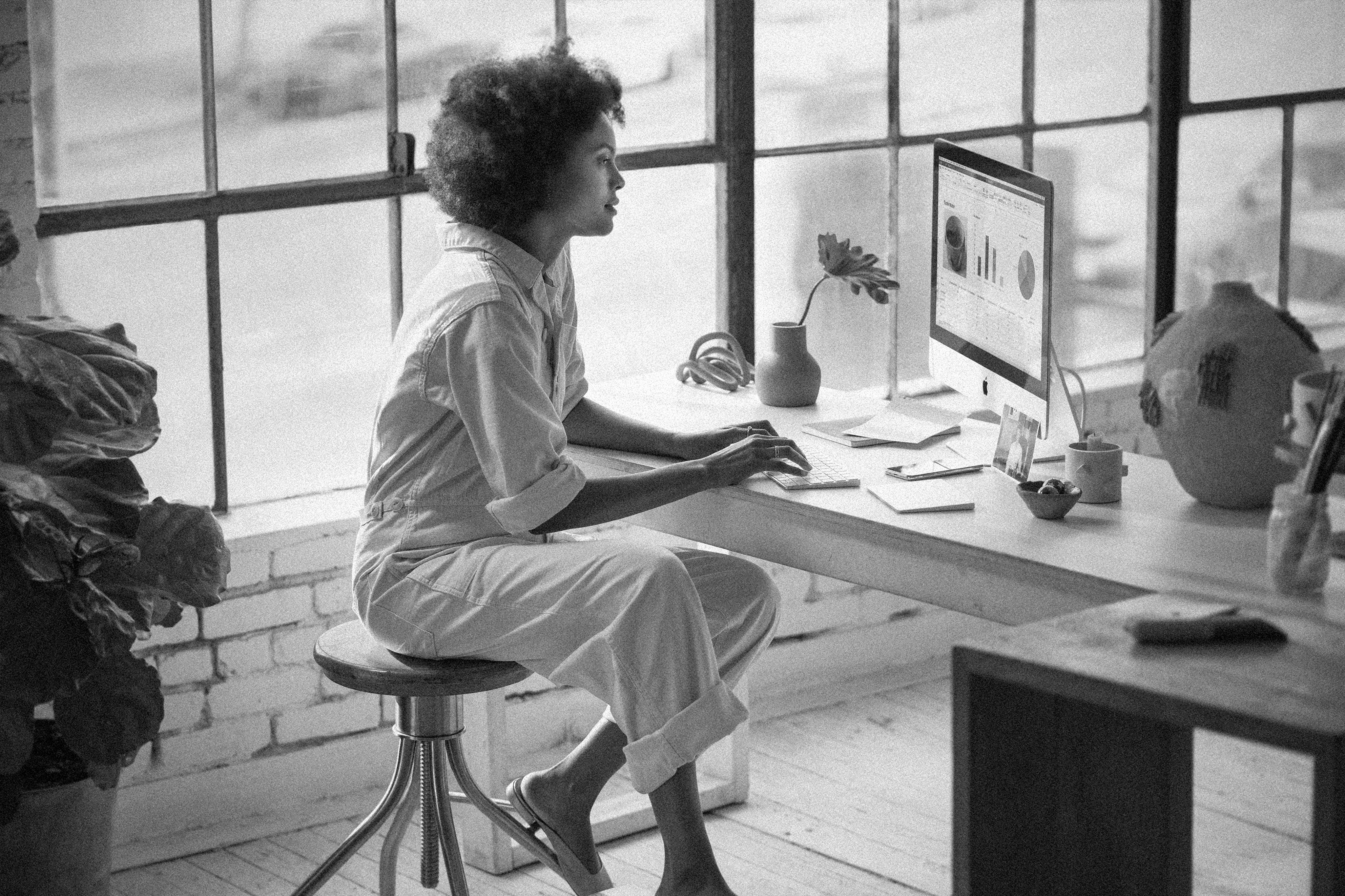 Amazon seller working at a desktop computer